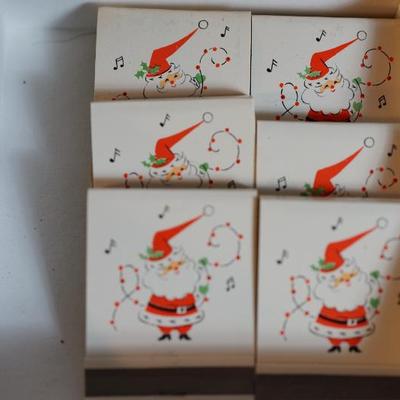 vintage Santa Hallmark match booklets not used. 