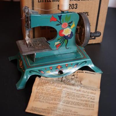 Original with box and instruction, Lindstroms "Little Miss" tin toy sewing machine, 