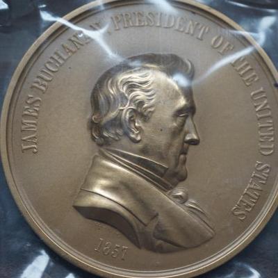 Large selection of bronze presidential medallions in original box, wrap with display piece. 