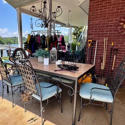 Sale Photo Thumbnail #150: Wrought iron tile top table and six chairs