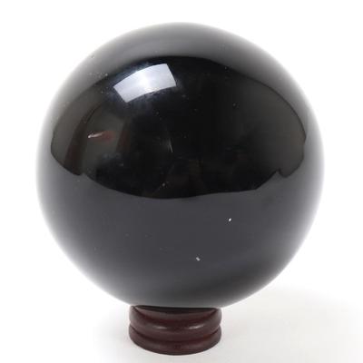 Sale Photo Thumbnail #205: Lot 204 wonderful natural obsidian sphere wstand