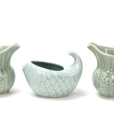 Sale Photo Thumbnail #359: Lot 358 group of three chinese celadon glazed creamers