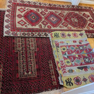 Collection of Three Handwoven Tribal Rugs Featuring Prayer and Geometric Motifs