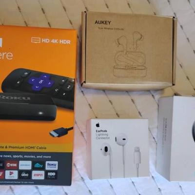 Em156 roku premiere and apple earbuds