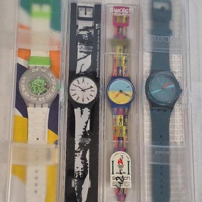 4 New Swatch Watches In Boxes, Retail $400 Together LOT21 - Reserve $150