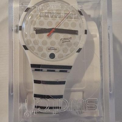 New Swatch Watch In Box.  Retail $170.  Lot 23 - Reserve - $80