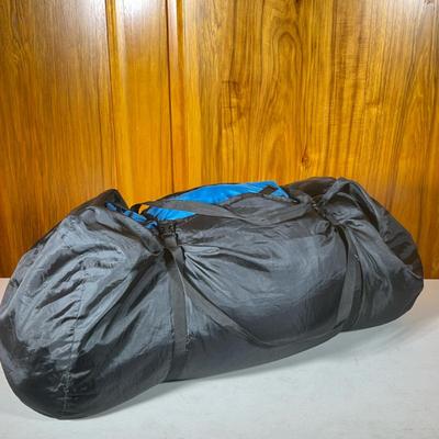 Outdoor Sleeping Bag | Zippered down filled designed to fold into black carrying case. - h. 16 x w. 16 x l. 30 in
