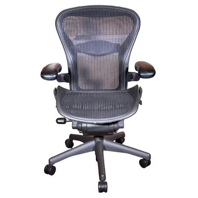 Herman Miller Aeron Chair | Size B. Featuring adjustable armrests, adjustable tilt tension, adjustable height, back and forward tilts,...