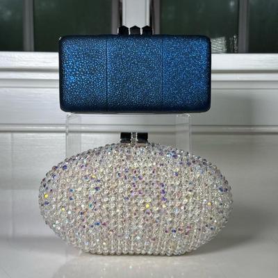 (2pc) Wyatt & Sondra Robert’s Evening Clutches | Including rectangular clutch with metallic blue textured finish and clasp closure...