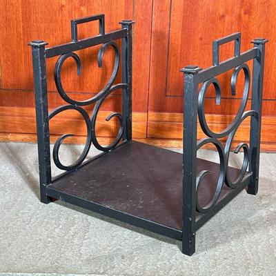 Scrolled Metal Fireplace Log Holder | Black metal firewood rack, having rectangular base and two side panels with decorative scrollwork -...