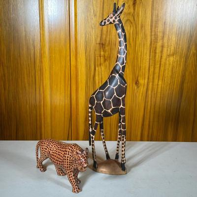(2pc) Carved Wood Wild Animals Statues | Tall Giraffe and roaring leopard figures. - h. 23 x w. 3 x d. 5.5 in (Giraffe, 6” h leopard)
