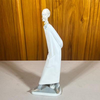 Lladro “Doctor” | Tall statue of a doctor with stethoscope. Model number 4602, marked on bottom. Dimensions: h. 14 x w. 5 in
