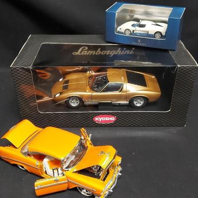 THREE COLLECTIBLE DIE CAST CARS