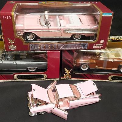 FOUR 1:18 DIE CAST CARS