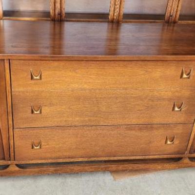 Broyhill Brasilia Credenza is located in storage, will not be at the sale. Please let us know if you are interested.
