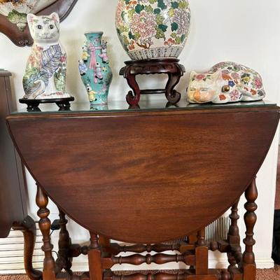 Sale Photo Thumbnail #45: Antique English double drop leaf table 