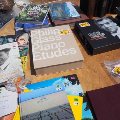 Books!  C'mon, show off with a Philiip Glass book on your coffee table.