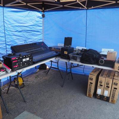 A bunch of LED tv's, a projector, and two Blackmagic 4k cameras.