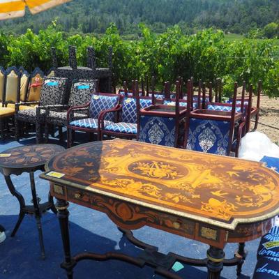 Chairs Behind Two Tables: a tableau