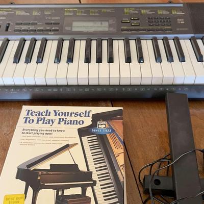 Casio CRK-2020 Keyboard, Stand & Piano Playing Introduction Book (no Cord Attachment)