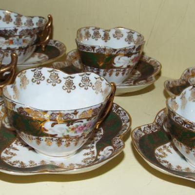 Sale Photo Thumbnail #132: ANTIQUE GILT EMBELIISHED HANDPAINTED COFFEE CUPS AND SAUCERS 