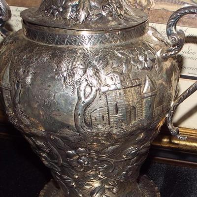 ANTIQUE S. KIRK & SONS STERLING REPOUSSE LEAFY BERRY PITCHER
ANTIQUE STERLING REPOUSSE LIDDED CONTAINER WITH VILLAGE IMAGES
