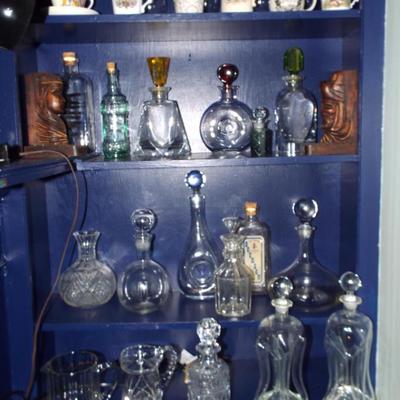 ASSORTED DECANTERS AND BOTTLES SOME WITH PAPERWEIGHT BOTTOMS