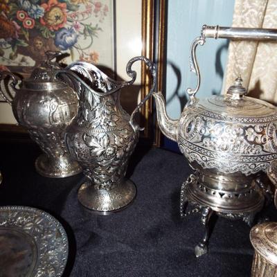 ANTIQUE S. KIRK & SONS STERLING REPOUSSE LEAFY BERRY PITCHER
ANTIQUE STERLING REPOUSSE LIDDED CONTAINER WITH VILLAGE IMAGES
