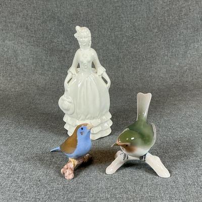 Porcelain Bird Figurines And Porcelain Lady In Gown Holding A Bonnet Figurine With Vase