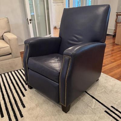 Two Leather recliners with gold studs 