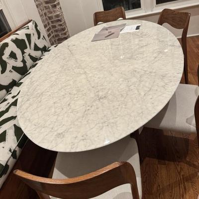Table measures 48 by 78. Signed w plaque 1957 and knoll underneath 