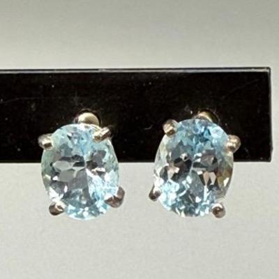 Sterling Silver With Oval Topaz Stud Earrings 