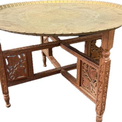 Carved Wooden Table With 2 Large Brass Tops