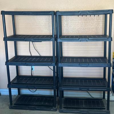 Two 70” Black Plastic Shelving Units