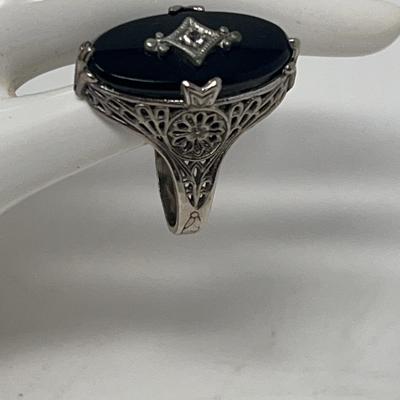 Sterling Silver Ring With Onyx And Diamond At The Center