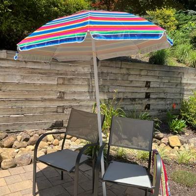 Patio Chairs with Colorful Striped Umbrella