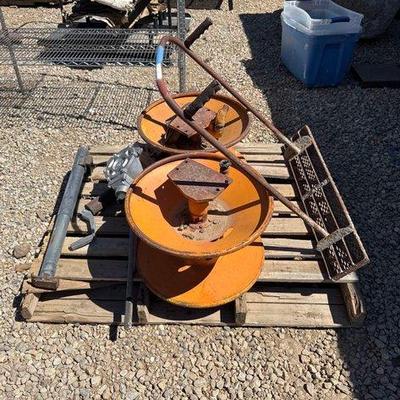Sale Photo Thumbnail #56: #1024 • 2 Hose Reels, 2 Trailer Landing Gears, Concrete Tamp, GPI Dual Flo Hand Pump
