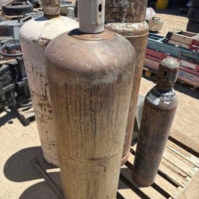 Sale Photo Thumbnail #278: #2258 • 4 Propane Tanks and 2 Master Racks, No Keys
