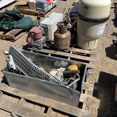 Sale Photo Thumbnail #329: #2416 • Pool Pump, Small Motor, Propane Tank, Jack Stand
