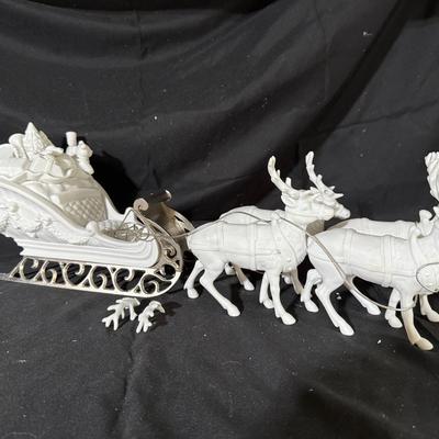 Lot 421: Dept 56 Winter Silhouette Santa’s Sleigh & 4 Reindeer – White Porcelain w/ Metal Runners (S
