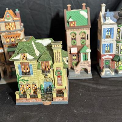 Lot 121:  Department 56 Four Christmas in The City Series Houses