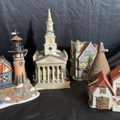 Lot 122:  Department 56…  Four Dickens Village Series Pieces