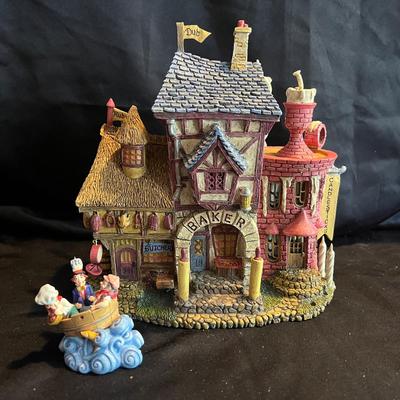 Lot 319: Department 56 Storybook Village – “The Butcher, Baker and Candlestick Maker” (Set of 2)    