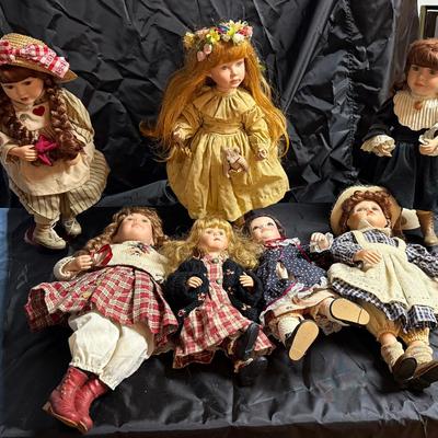 Lot 402: Lot of 9 Vintage Porcelain Dolls – Variety of Outfits & Styles – Great for Display or Craft