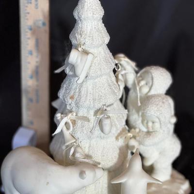Lot 182:  Department 56 Snowbabies figurine titled "Lift Me Higher, I Can't Reach". 