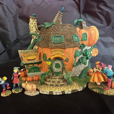 Lot 314: Department 56 Storybook Village – “P. Peters” Pumpkin Pie Shop (Set of 3)      