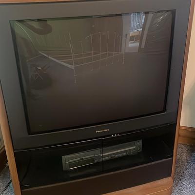Wooden Entertainment Center, Panasonic 32in TV, Emerson DVD And VHS Player