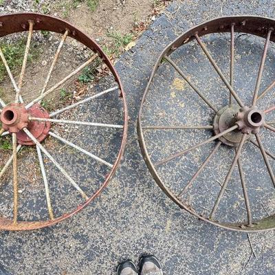 Two Large Metal Wheels