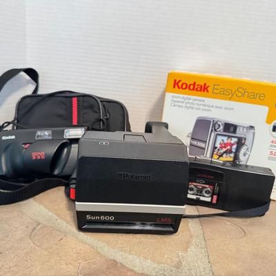 Polaroid & Kodak Cameras And More