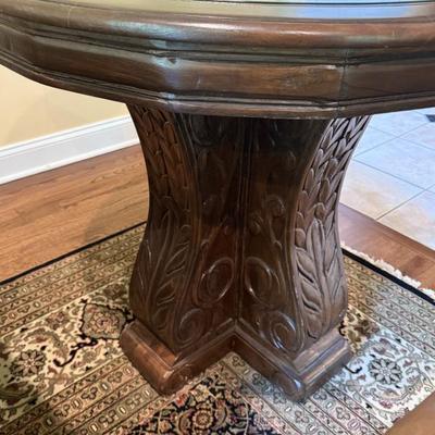36" Hand carved wooden end table with glass top and geometric insert